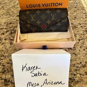 Louis Vuitton Josephine wallet in Monogram and Fucia